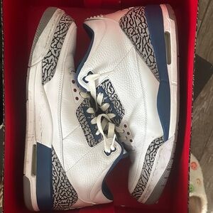 Jordan White and Blue Sneakers with Red Accents